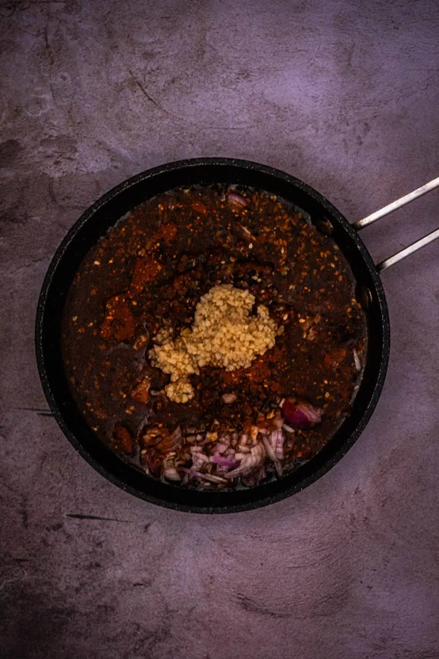 Instructions 3: Remove from heat and stir in shichimi togarashi. Transfer to a jar and let sit at room temperature for a few hours or ov