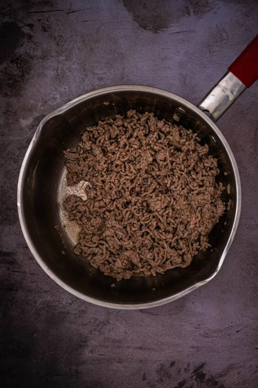 Instructions 1: In a large pot, heat toasted sesame oil over high heat. Add ground pork and black pepper and cook, breaking up the meat,