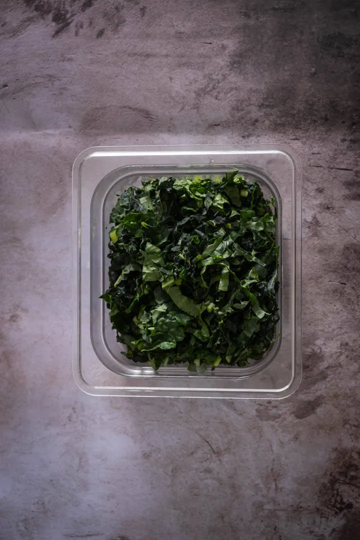 Instructions 2: Clean and de-stem the kale, then tear into bite-sized pieces.