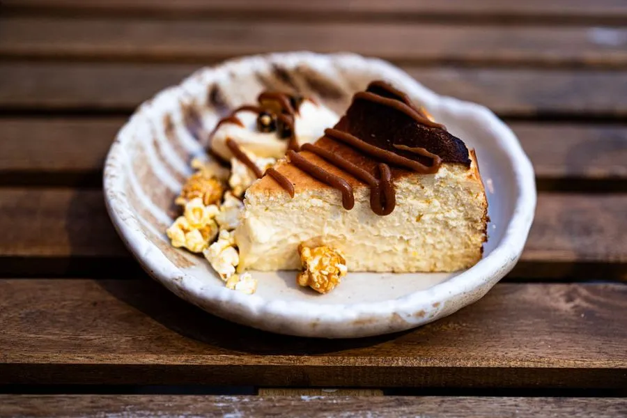 Basque corn cheesecake at Giwa Verdun with torched corn and corn ice cream, a creamy and toasty seasonal dessert