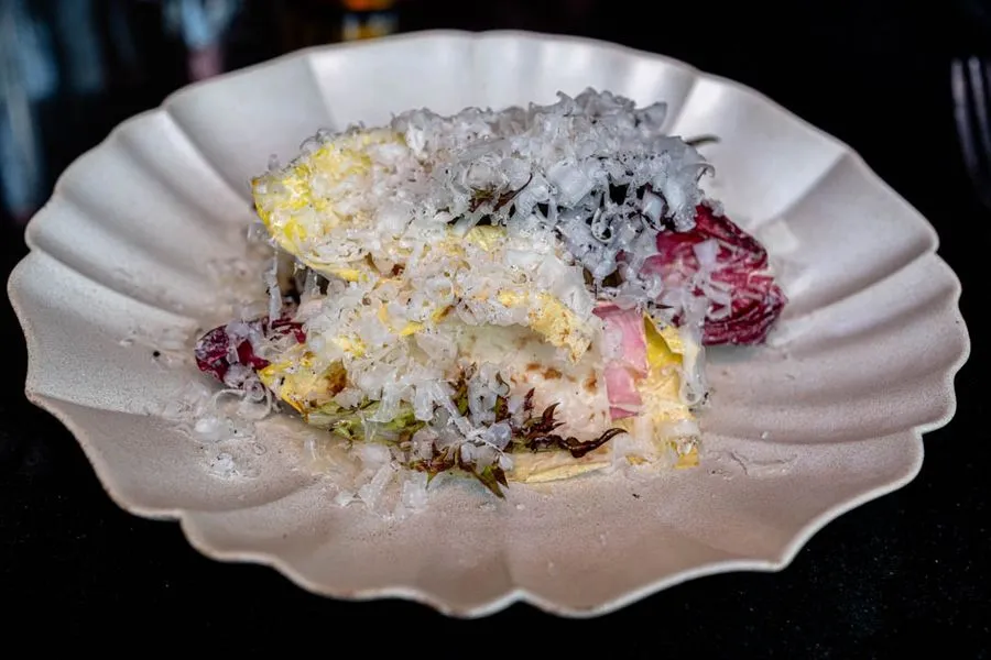 Third course at Île Flottante Montreal, seasonal ingredients handled with controlled, precise technique