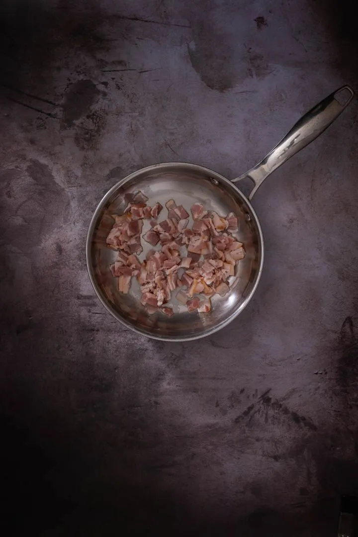 Instructions 1: Add bacon to a cold pan and set over medium heat. Cook until crisp and a good amount of fat has rendered, about 8 minute