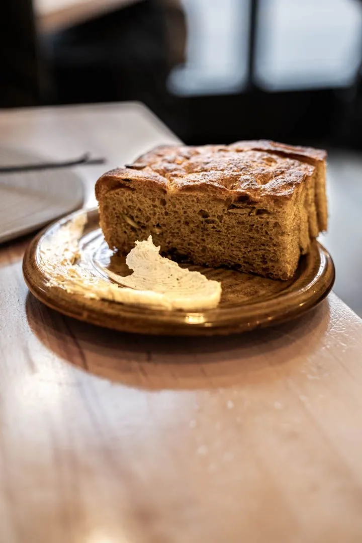 Organic rye and sunflower bread at Othym Montreal, a dense nutty loaf from local producers that stands up beautifully to the fermented flavors on the menu