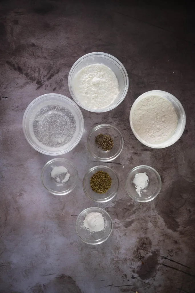 Ingredients for the batter of the vegetable chips: flour, cornstarch, oregano, baking powder, salt, black pepper, sparkling water and rice flour.
