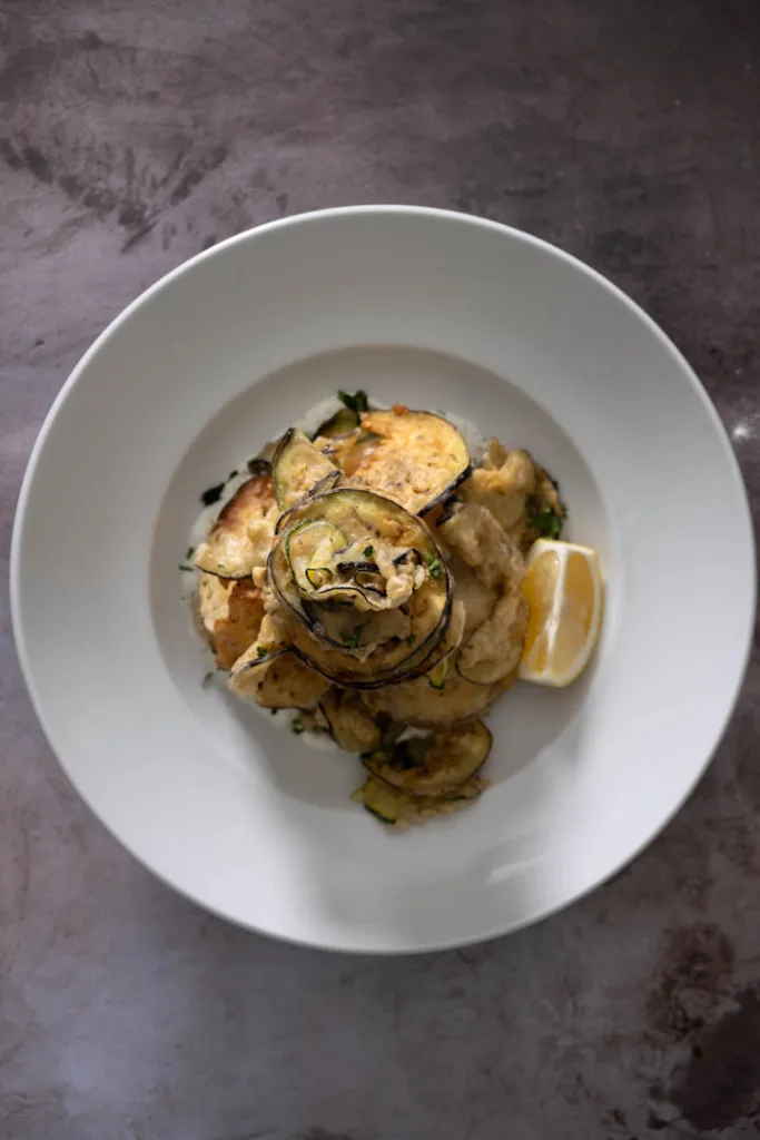 Overview of a finished delicious zucchini eggplant chips for a date night