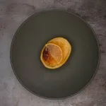 Lemon Posset Brûlée, a creamy, tangy, and delightfully crisp dessert that perfectly balances sweetness and zest